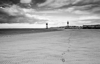 Lighthouse Beach BW Footprints Clouds 1920 x 1200 340x220