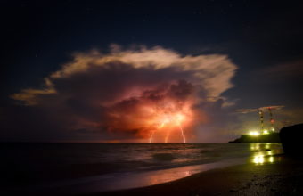 Nature force background – lightning in dark sky, sea